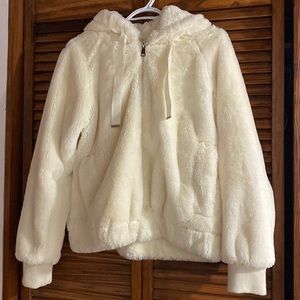Fluffy white vest/coat, very soft, worn once to take a picture.